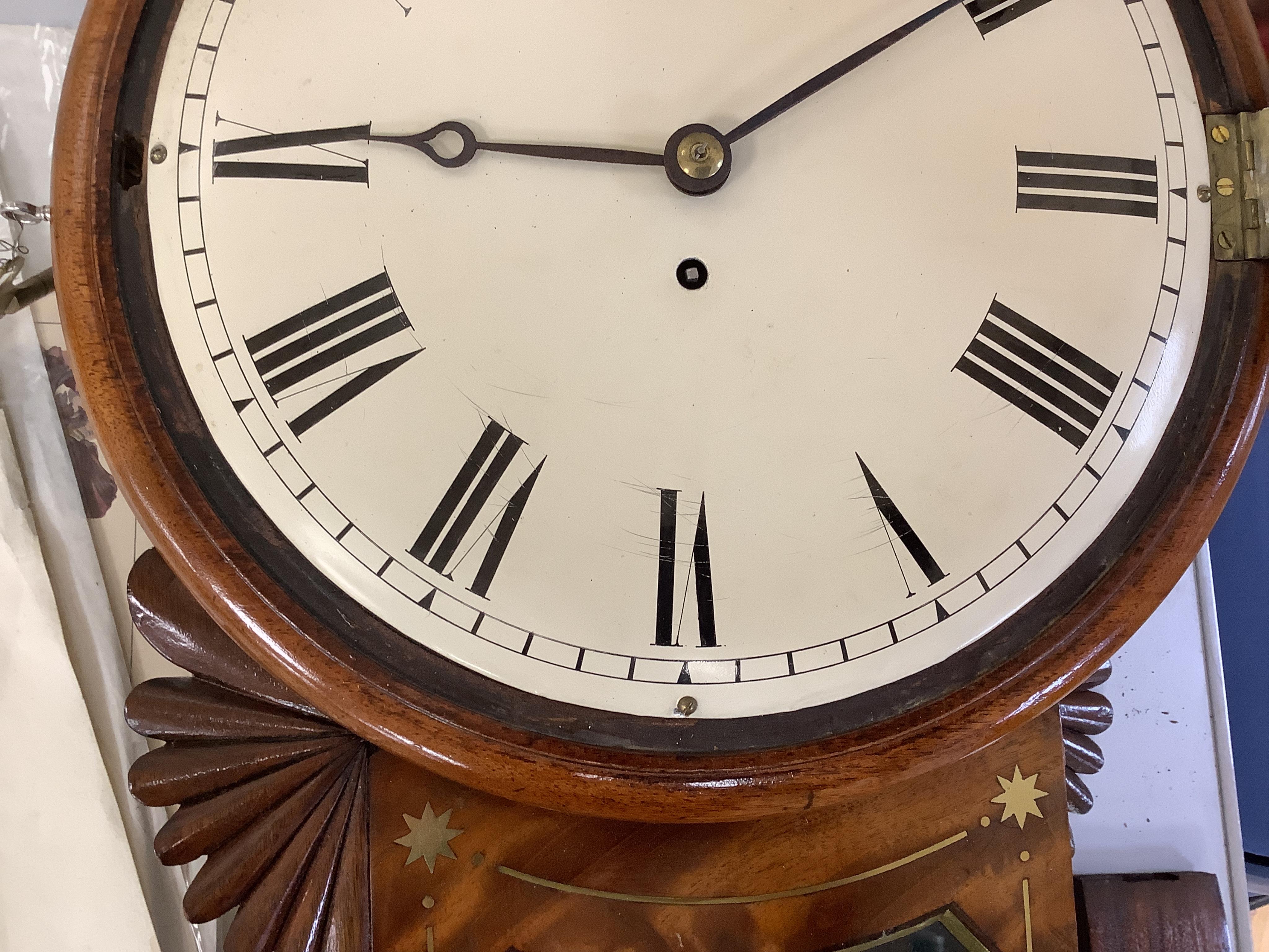 A 19th century mahogany drop dial fusee wall timepiece, with brass inlay and a painted 12 inch dial
